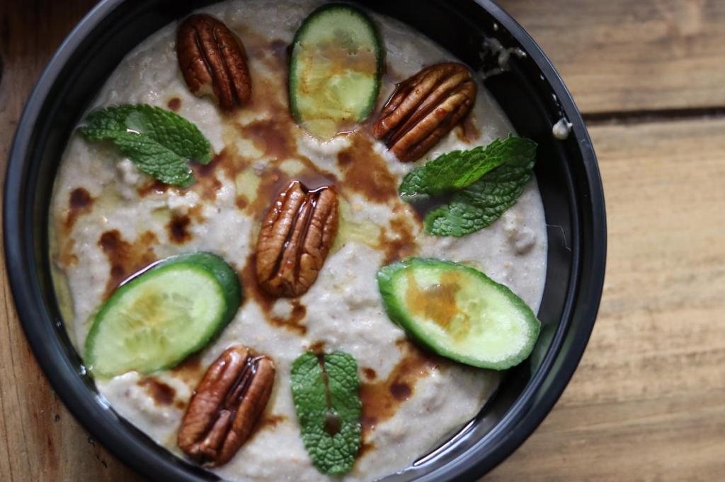 Mint Kitchen's yummy babaganoush is topped with cucumbers, walnuts, and fresh mint leaves
